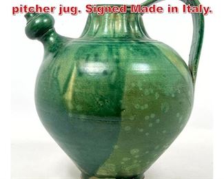 Lot 232 Italian green pottery pitcher jug. Signed Made in Italy. 