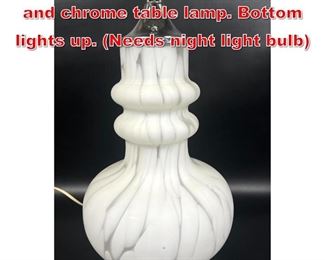 Lot 238 White Murano oil spot glass and chrome table lamp. Bottom lights up. Needs night light bulb