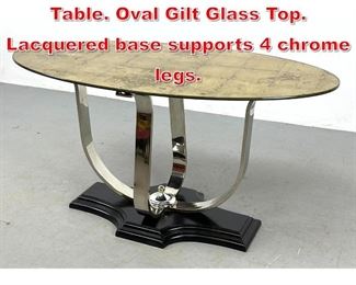 Lot 260 Art Deco style Hall Center Table. Oval Gilt Glass Top. Lacquered base supports 4 chrome legs. 