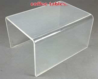 Lot 289 Thick Lucite U shaped coffee tables.