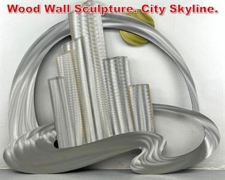 Lot 311 Artist Signed Metal on Wood Wall Sculpture. City Skyline. 