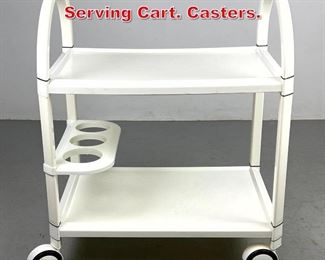 Lot 339 Modernist White Rolling Serving Cart. Casters. 