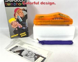 Lot 374 SWATCH twin phone in box. Colorful design. 