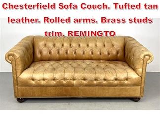 Lot 448 Vintage Leather Chesterfield Sofa Couch. Tufted tan leather. Rolled arms. Brass studs trim. REMINGTO