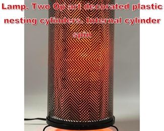 Lot 466 OP ART Modernist Motion Lamp. Two Op art decorated plastic nesting cylinders. Internal cylinder spin