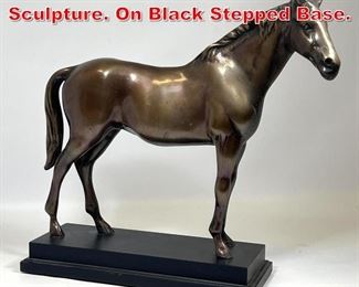Lot 483 Figural Brass Horse Sculpture. On Black Stepped Base. 