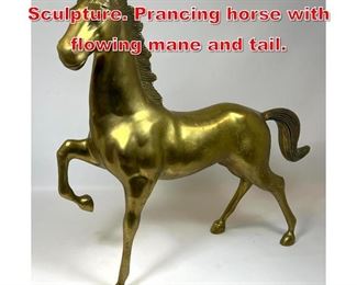 Lot 487 Brass Figural 24 Horse Sculpture. Prancing horse with flowing mane and tail. 