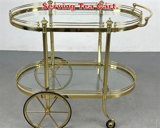 Lot 516 Brass and Glass Rolling Serving Tea Cart. 