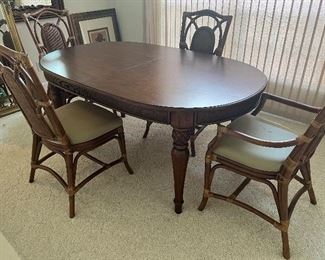 $600 - Tommy Bahama style dining room table with chairs and additional leaf. Measurements: 67" x 42" x 30" (leaf is 20" - not shown)