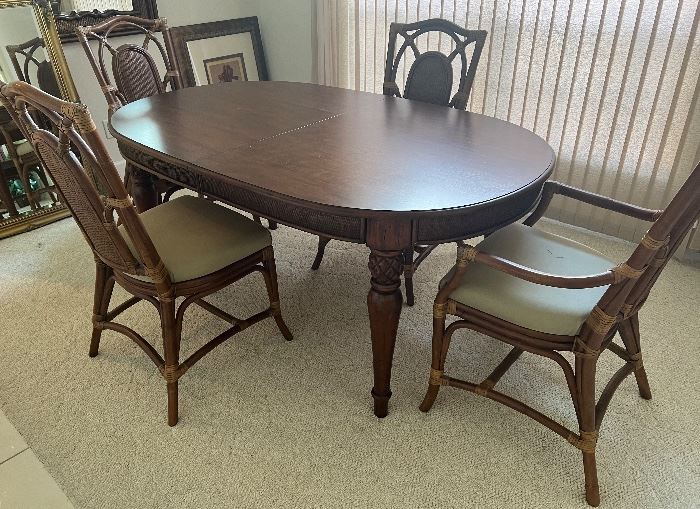 $600 - Tommy Bahama style dining room table with chairs and additional leaf. Measurements: 67" x 42" x 30" (leaf is 20" - not shown)