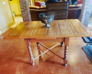 Antique dining extending table