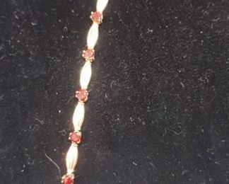 14k gold bracelet with garnets