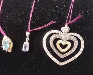 14k gold pendent with stones etc