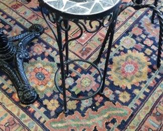 cute wrought iron and tile plant stand