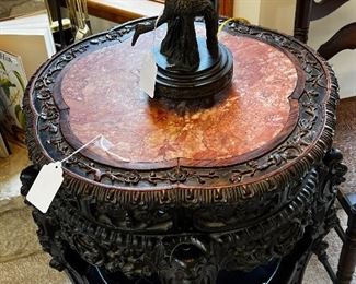 MARBLE TOP HEAVILY CARVED TABLE