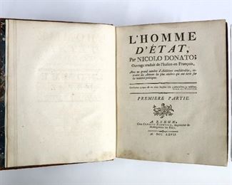 Donato, Nicolo.  "L'Homme d'etat" Volumes I & II, First French Edition.  France; Clement Plomteux, MDCCLXVII (1767).  Full leather with mottled calf covers, raised bands and sprinkled edges, 4to (10" high).  Wear with some losses, pages with toning, some foxing and minor staining.  ESTIMATE $40-60