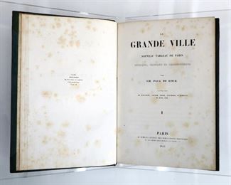 Kock, Paul de.  "La Grande Ville" Volumes I & II.  Paris; Maulde et Renou, 1842.  Half Morocco over cloth boards, 8vo (9" high).  Some wear and losses, pages with toning and foxing, book plates.  ESTIMATE $20-40