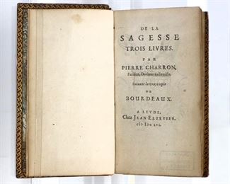 Charron, Pierre.  "De la Sagesse Trois Livres".  Leyde; Jean Elzevier, 1656.  Full speckled calf with gilt edges, 24mo (5 1/4" high).  Wear and losses, back cover detached, pages with minor toning and foxing, book plate.  ESTIMATE $20-40
