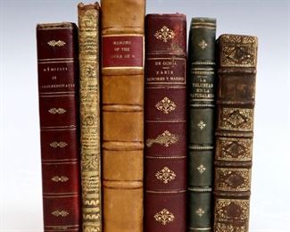 Six 18th to 20th century books.  Includes Aymon, Jean "Tableau de la Cour de Rome" 1726; Machiavelli, Niccolo di Bernardo dei "Il Principe" 1813; La Rochefoucauld, Francois de "Memoires du Duc de la Rochefoucauld" 1804; Schopenhauer, Arthur "Sobre la Voluntad en la Naturaleza" 1900; Guillermo, Juan "Memoirs of the Duke de Ripperda" 1760; and Ochoa, D. Eugenio de "Paris, Londres y Madrid" 1861.  Quarter to full leather, 24 mo to 12mo (up to 7 3/4" high).  Some wear and losses, pages with toning and foxing.  ESTIMATE $20-40
