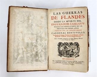 Bentivoglio d'Aragona, Guido.  "La Guerras de Flandes desde la Muerte del Emperador Carlos V" Spanish Edition.  Antwerp; Geronymo Verdussen, MDCLXXXVII (1687).  Full speckled calf with raised bands and sprinkled edges, folio (13 1/4" high).  Wear and damage, splitting at spine, pages with toning and minor foxing.  ESTIMATE $20-40