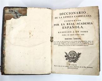 La Real Academia Espanola.  "Diccionario de la Lengua Castellana"  Third Edition, reduced to one volume.  Madrid; Don Joaquin Ibarra, c. 1780s.  Full paneled calf with raised bands, folio (14 1/2" high).  Wear and losses, pages with toning and foxing, some tears and staining.  ESTIMATE $20-40