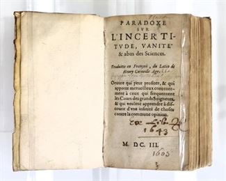 Agrippa, Heinrich Cornelius.  "Paradoxe sur l'Incertitude, Vanite' et abus des Sciences" translated to French by Henry Corneille.  France; MDCIII (1603).  Vellum bound, 24mo (5 3/4" high).  Some wear and losses, pages with toning and minor foxing, book plate.  ESTIMATE $40-60