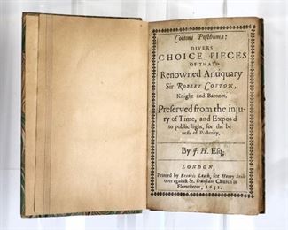 Cotton, Robert & Howel, James.  "Cottoni Posthuma: Divers Choice Pieces of that Renowned Antiquary Sir Robert Cotton, Knight and Baronet".  London; Henry Seile, 1651.  Hardcover with marbled boards, 16mo (6 3/4" high).  Some wear and damage, lacks spine cover, pages with toning, minor foxing, some water and insect damage.  ESTIMATE $20-40