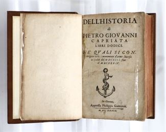 Capriata, Pietro Giovanni.  "Dell 'Historia ne Quali si Contengono Tutti I Mouimenti d'Arme Successe in Italia".  Genoa; Philippo Gamonet, MDCXXXIX (1639).  Full calf with raised bands and painted edges, 16mo (6 3/4" high).  Some wear, pages with toning and foxing, small edge tears to title page.  ESTIMATE $20-40