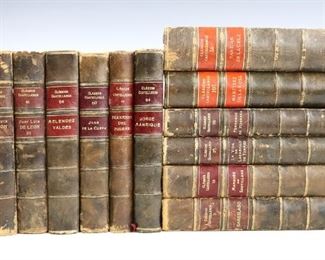 Twelve volumes of "Clasicos Castellanos" by authors including Manrique, Valdes, de la Cueva, del Pulgar, de Leon, de la Cruz, della Rosa, de Herrera, de Lazarillo de Tormes, de Santillana and Garcilaso.  Madrid; 1920s.  Full marbled calf with raised bands and deckled/painted edges, 12mo (7 1/2" high).  Some wear and minor losses, label marks at covers, pages with toning and foxing, library and blind stamps.  ESTIMATE $100-150