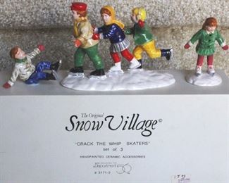 207 - Dept 56 Crack The Whip Skaters in a box
