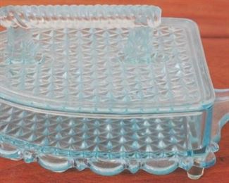 279 - Fenton blue glass covered box, iron shape 6.5x5
