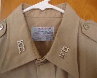 KC PD pins on uniform shirt
