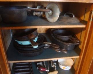 Many cast iron skillets