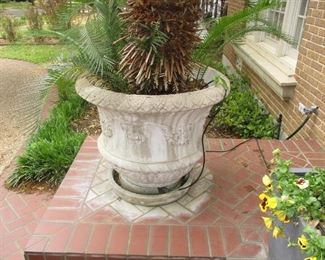 One of three large matching outdoor pots.  Bring lots of help to move