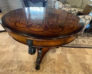 Inlaid walnut table with bronze