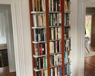 Custom Bookshelves measure 88” tall, width varies from approximately 36” to 45”, depth varies from 7” to 13”.