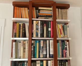 Custom Bookshelves measure 88” tall, width varies from approximately 36” to 45”, depth varies from 7” to 13”.