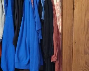 interior of antique pine Armoire with hanging rod