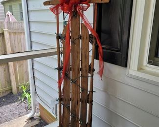 vintage wooden sleigh with lights