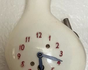 Lux Schmoo Novelty Wall Clock.  Pendulum may need straightening because it does not keep swinging.
Dimensions: 8"H x 3 3/4" W.                                                       $50 or Best Offer. 