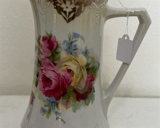 Floral Pitcher. Dimensions: 9 1/4" H x 6.5" W.                  
$12 or Best Offer. 