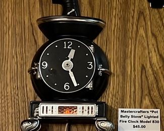 Mastercrafters "Pot Belly Stove" Lighted Fire Clock Model 830.  $45 or Best Offer. 