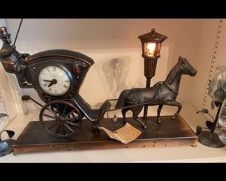 United Sessions Horse Carriage & Cab Bronze/Brass Motion Clock Model 701. 
There are 2 available. 

$150.00 or Best Offer. 