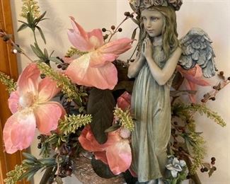 Many Floral Contained Arrangements And Statuary