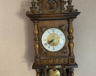 Carved wall clock