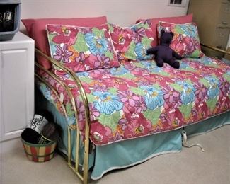 Brass Trundle bed.  Includes upper and lower mattresses