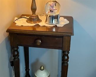 small one drawer night stand, stained glass-like lamp