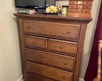 newer chest of drawers, small jewelry box, small Phillips flat screen tv
