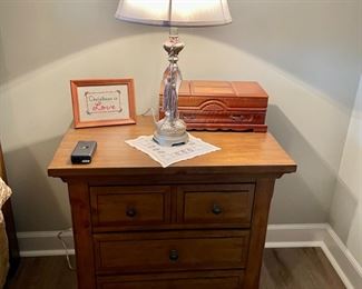 nightstand, carved jewelry box, lucite lamp