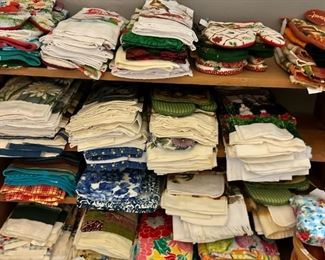 tons of dish towels, cloths and pot holders